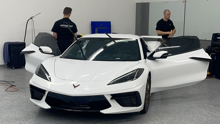 Corvette inside the Lifetime Tint detail bay in Jacksonville
